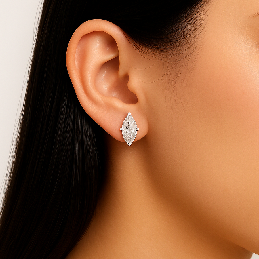 Marquise cut moissanite stud earring on ear close-up view