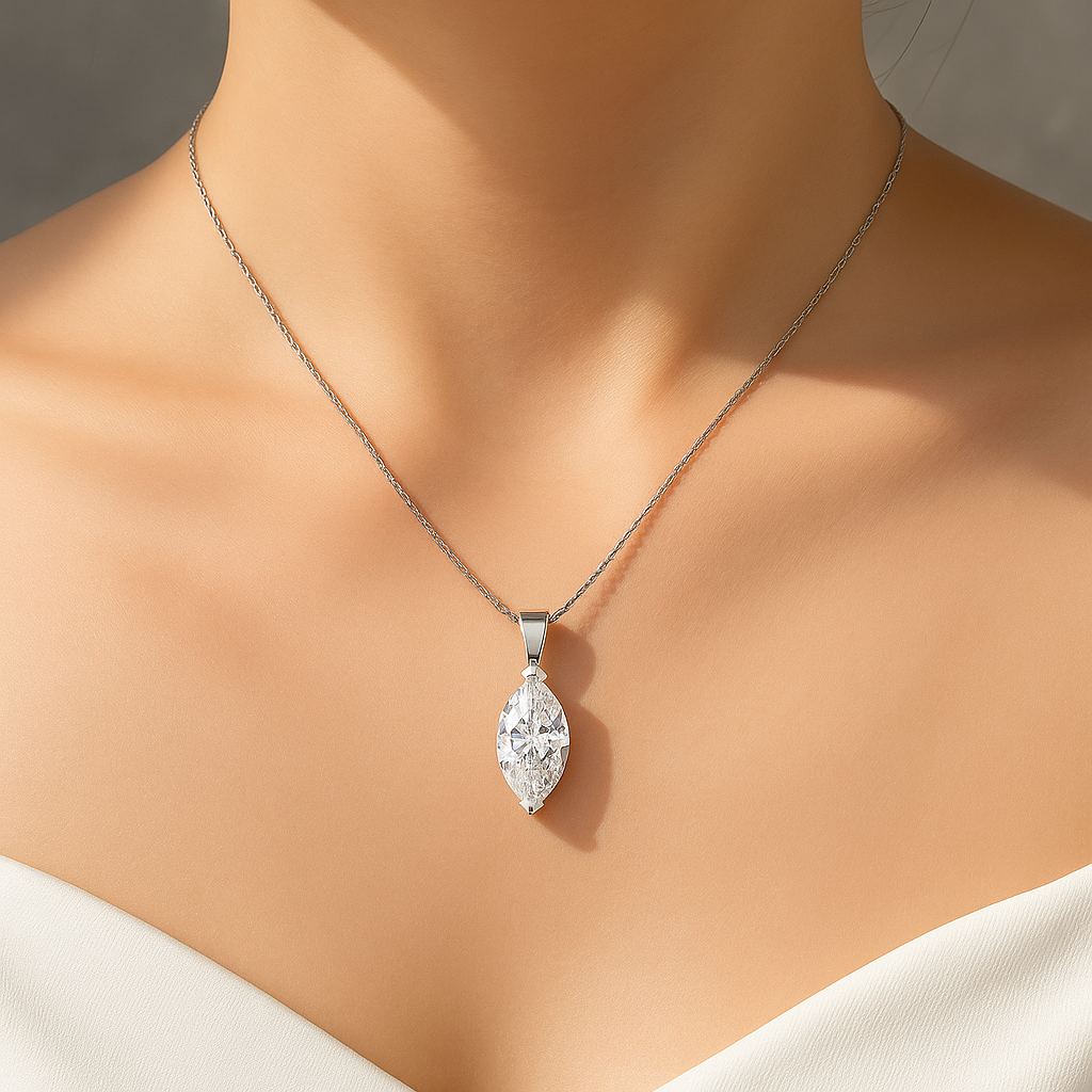 Marquise cut moissanite pendant necklace close-up on model’s neckline