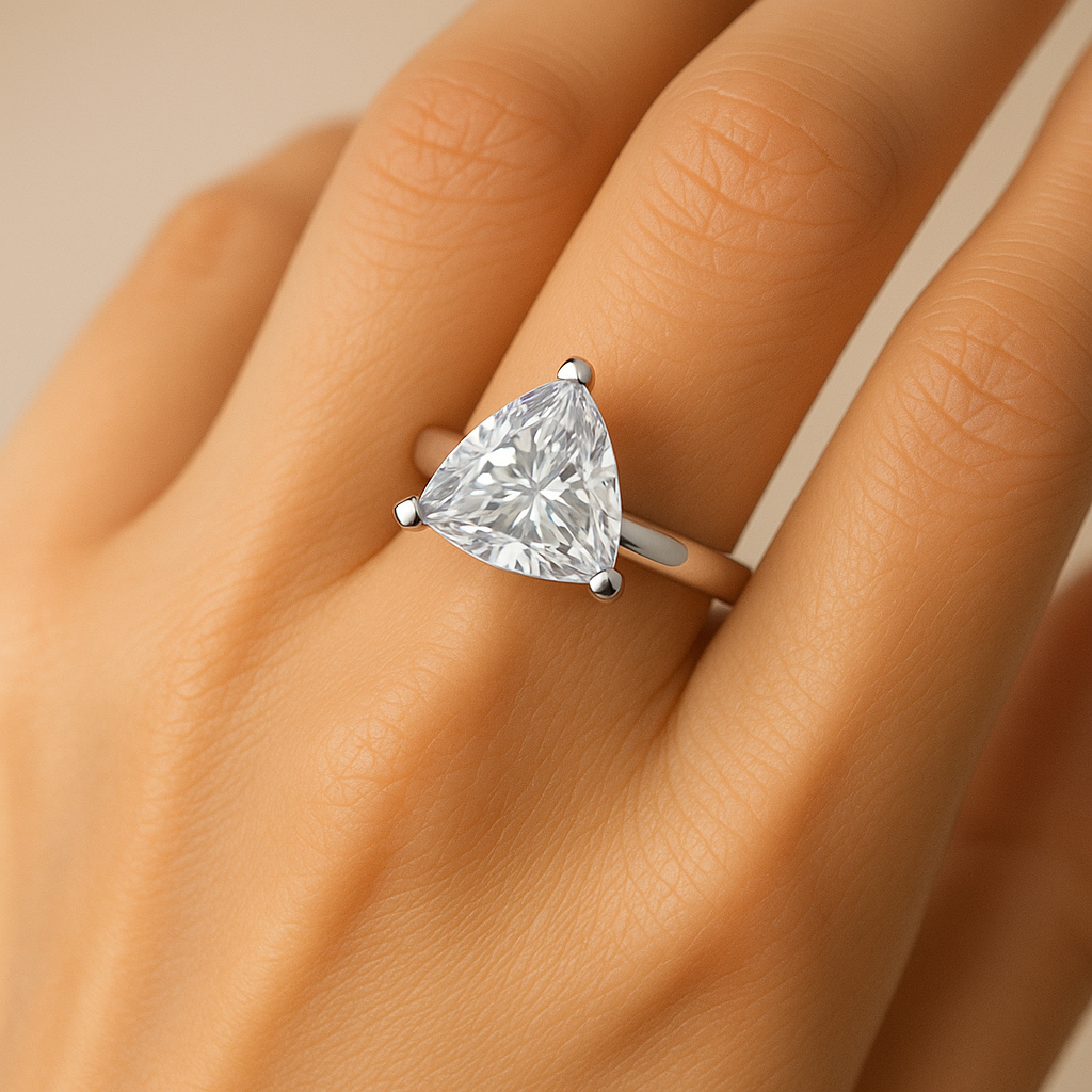 Trilliant cut moissanite engagement ring on hand showing 2.5 carat solitaire sparkle